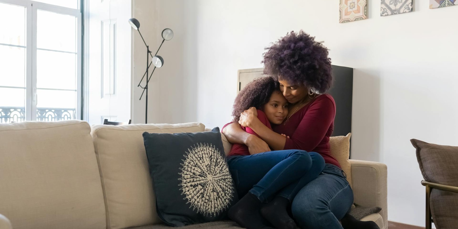 Family in front of house